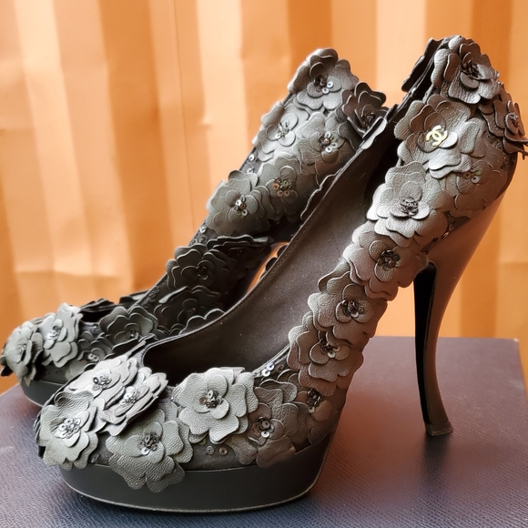 CHANEL Shoes - Chanel Black Leather Laser Cut Camellia Platform Pumps 40.